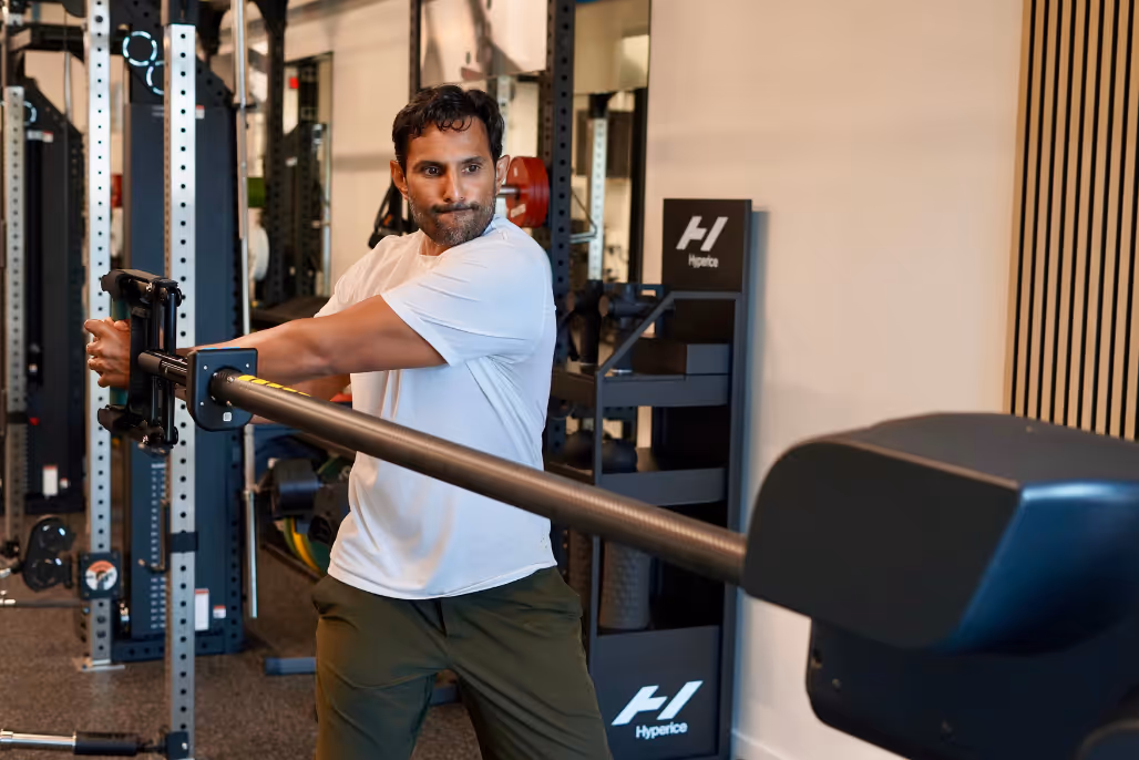 Member reviewing strength assessment results from proteus test at proof3 gym